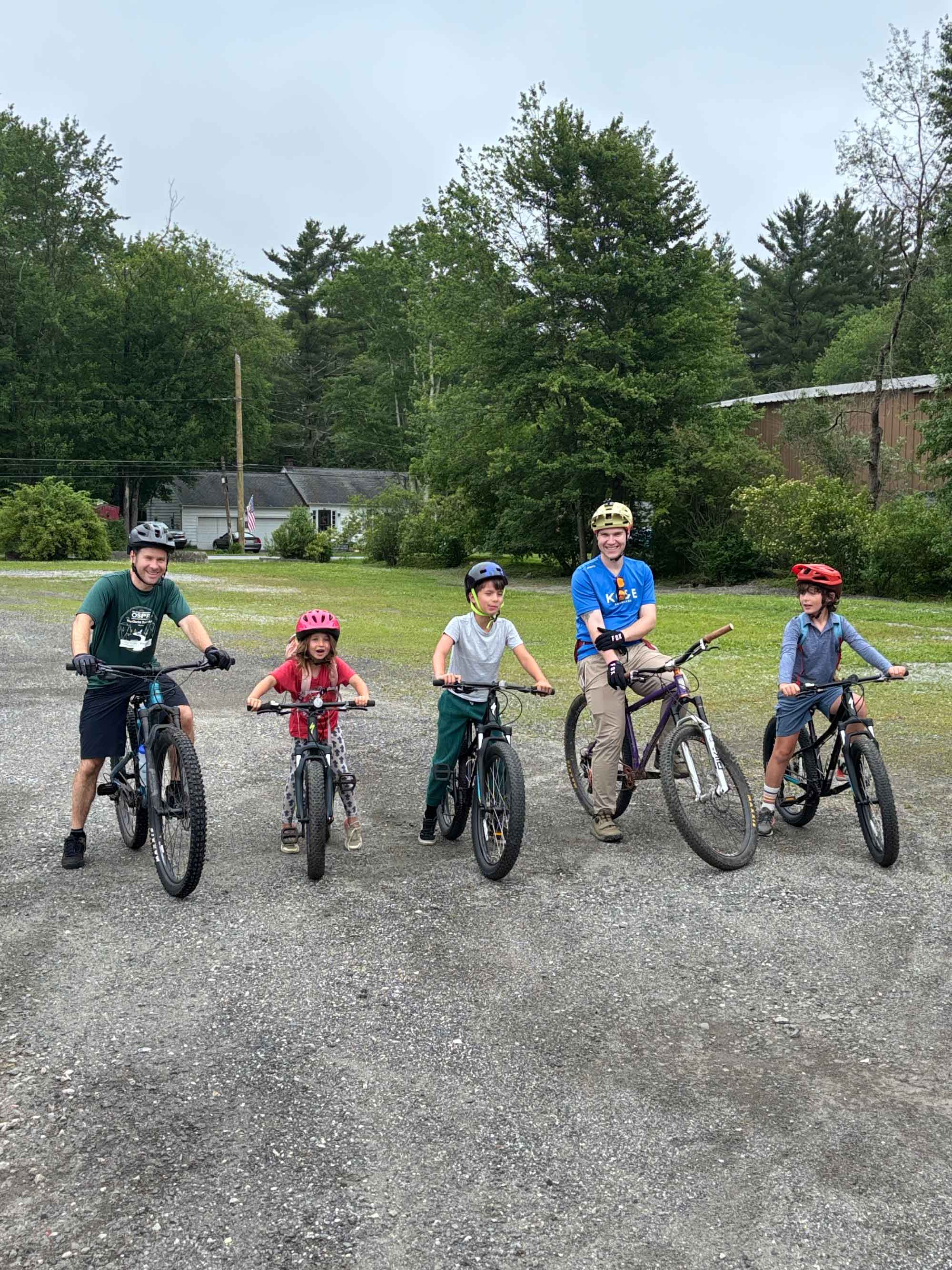 Kids and counselors on bikes